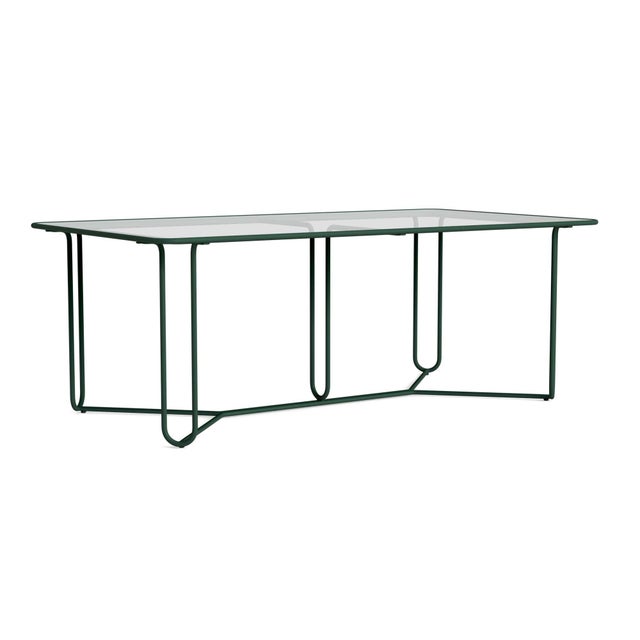 A free flowing frame design and transitional glass tabletop define the Walter Lamb Aluminum 20" Round Occasional Table....