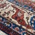 Fine Persian Isfahan Tree of Life hand-knotted pictorial rug featuring an exquisite ivory field anchored by a soaring...