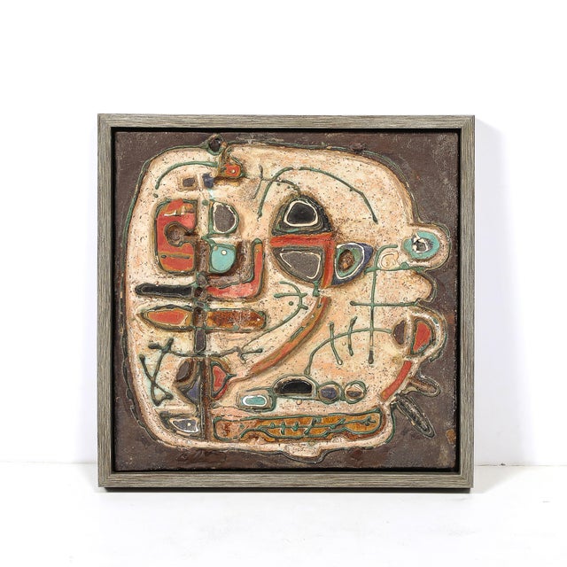 This mid-century modernist abstract glazed earthenware plaque by Sofia Kisselov, crafted in Israel circa 1960, exemplifies...