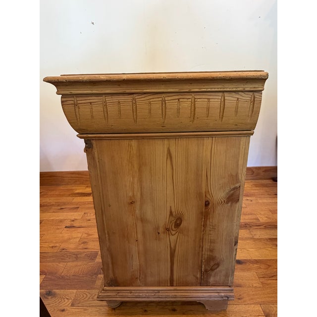 Up for sale on our floor is an Antique Scrubbed Pine Server with incredible detailing and appeal. This specific server...