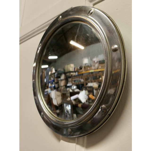 Chrome Convex Wall Mirror This is an attractive Mirror has a 1.5” wide with simulated rivets giving it a nautical look and...