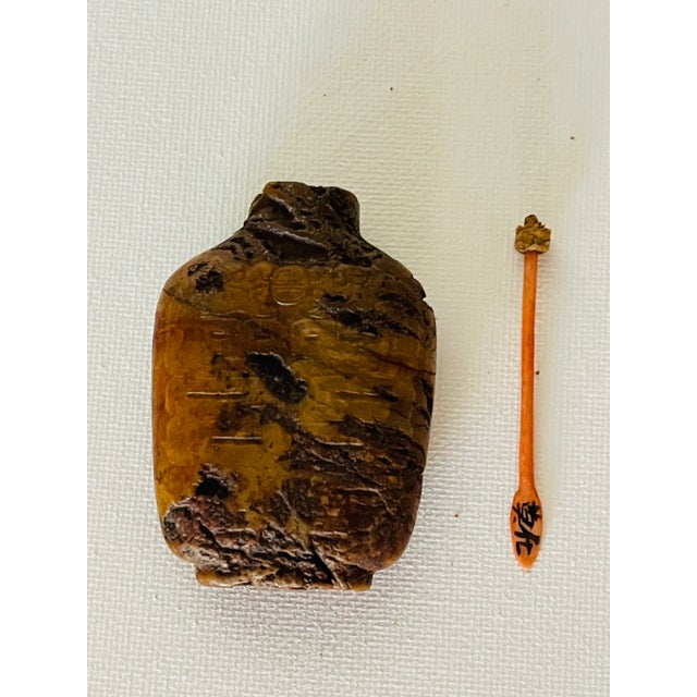 Chinese Qing dynasty rusted Jade perfume bottle. Handcarved on both sides with Chinese symbols.