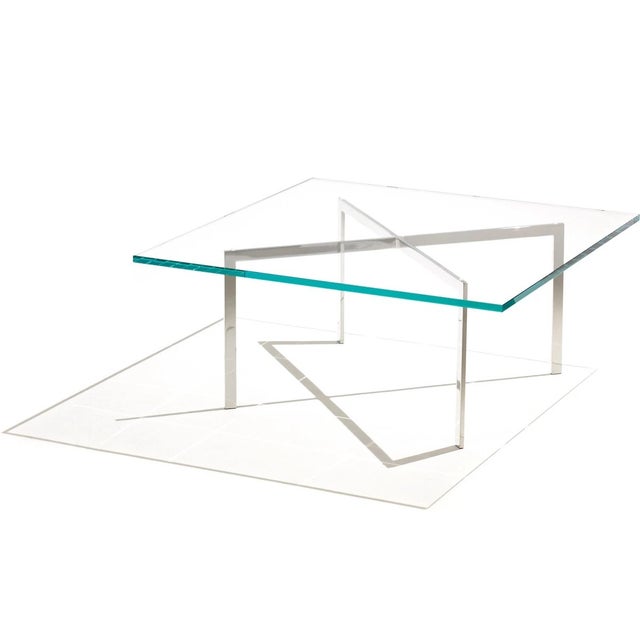 Authentic Barcelona coffee table designed by Ludwig Mies van der Rohe and Lily Reich designed in 1930. Stainless steel "X"...