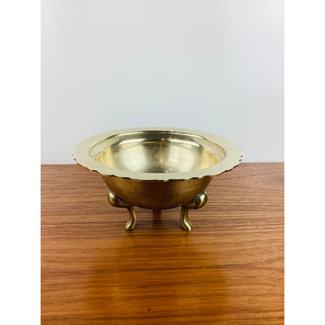 Vintage 1970s Brass Footed Bowl round in shape scalloped edge 3 brass feet measures appx - 8.25"W - 4.25"T great vintage...