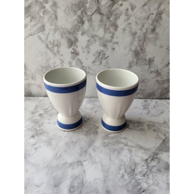 Pair of Arabia Finland egg cups in a classic blue design. It has a lovely glaze as well. Collectors of mid-century Arabia...