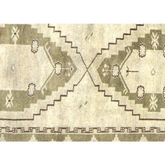 1960s Turkish Oushak Runner. Handwoven with wool on wool foundation in the Oushak region of Western Turkey. The Anatolian...