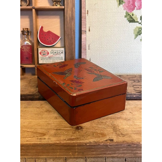 Believed to be a Japanese Lacquered wooden butterfly Box. Believed to be early 20th Century. Beautiful color and nice...