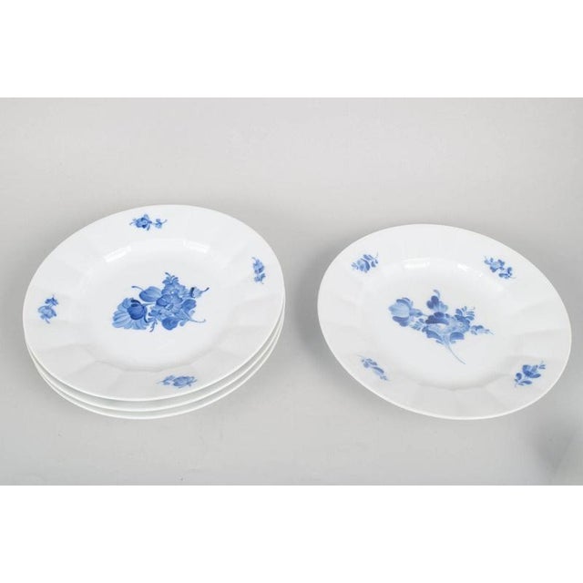 Royal Copenhagen Blue Flower Angular, set of four dinner plates. Set of four dinner plates in hand-painted porcelain from...