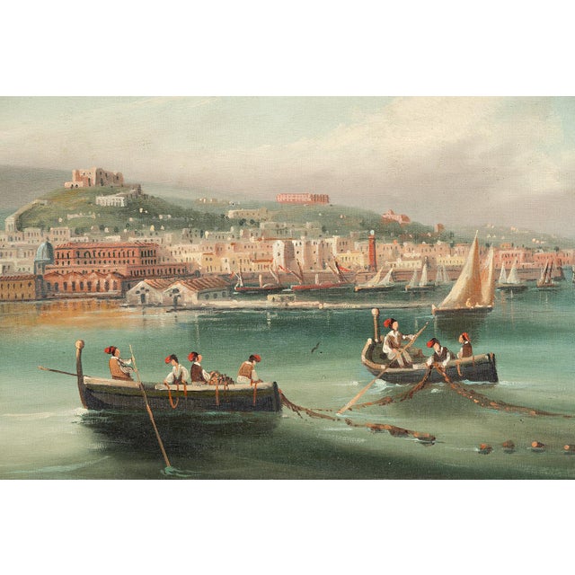 An antique oil-on-canvas painting in a period frame depicting a view of the Gulf of Naples, dating from the second half of...