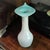 This vintage hand-blown art glass vase features a unique Jack-in-the-pulpit design in aqua blue and white colors. Made in...