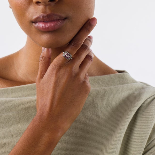 This elegant Art Deco style ring is a refined contemporary design inspired by the symmetry, color, and geometric beauty of...