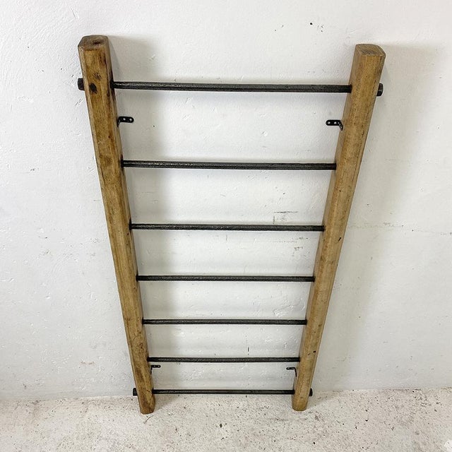 Antique towel rack Solid oak, treated against woodworm and stained Graphite-colored waxed steel Height: 127 cm Width: 64...