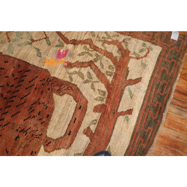 Rare room size early 20th Century Turkish Rug wool Rug made in central Turkey depicting a Large Lion on a brown field...