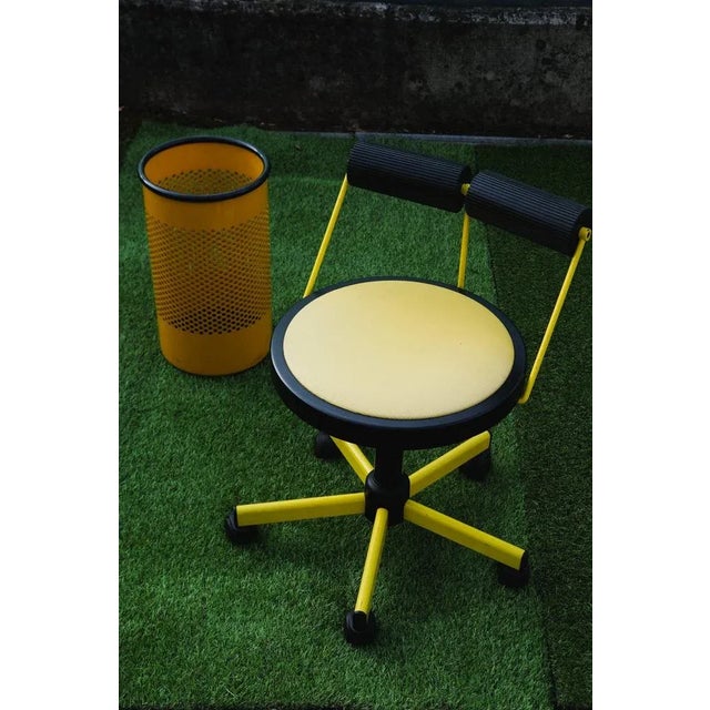 Iconic vintage 1980s Italian swivel desk chair, manufactured by Bieffeplast in Padova, Italy. This exceptional postmodern...