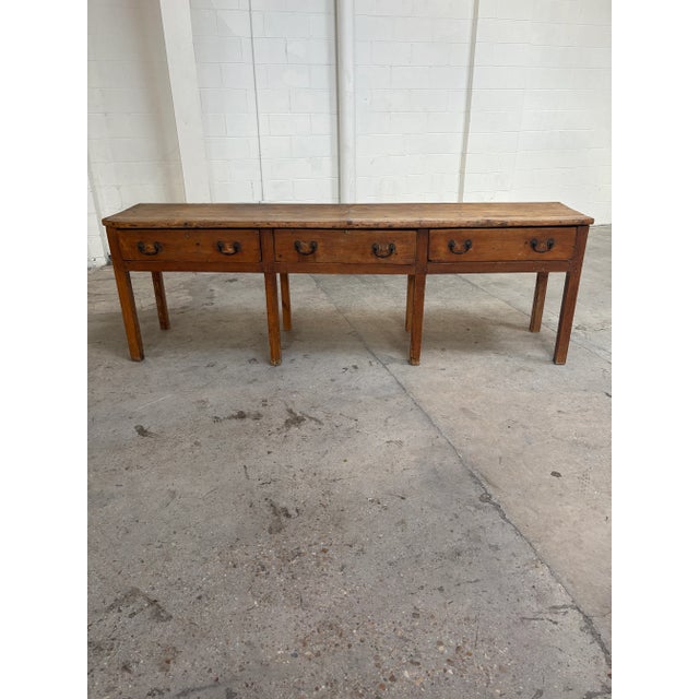 Incredible 101” long antique French provincial work counter or console. Heavy hand forged iron pulls. Dovetail drawers....