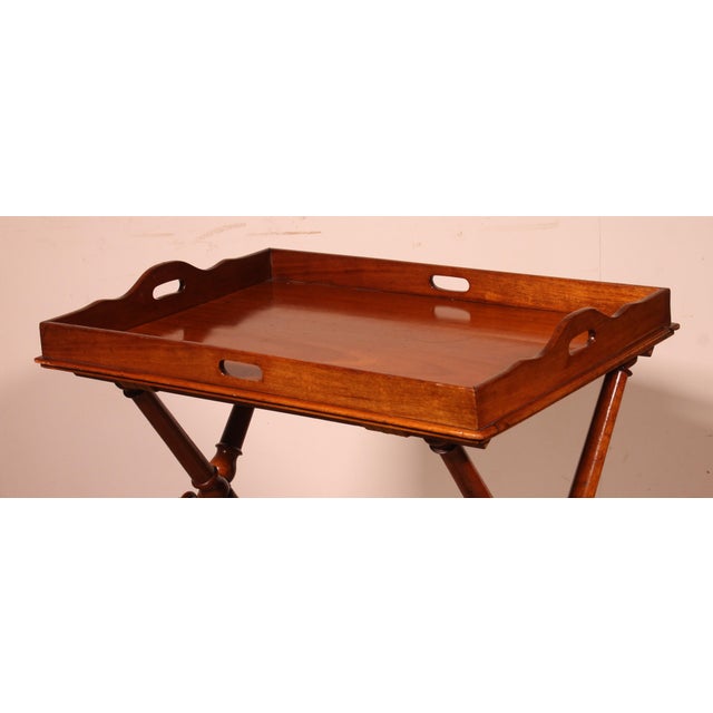A charming early 19th-century butler's tray in solid mahogany. Both the base and the top are solid mahogany. The beautiful...