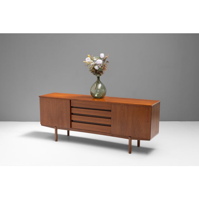 Large mid-century solid teak sideboard by Peter Hayward Vanson. U.K circa 1960. This piece has an attribution mark, I am...