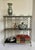 Mid-Century Modern Mid-Century Hollywood Regency Silver-Tone Metal Tabletop Étagère With Black Glass Shelves For Sale - Image 3 of 12