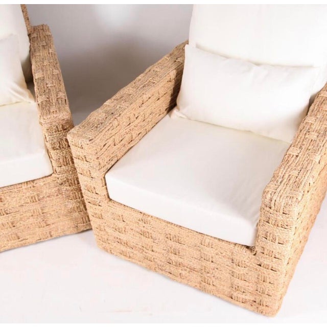 Exceptional pair of woven rush club chairs. Incredible hand-woven rush craftsmanship on this pair of very comfortable...