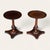 A near pair of early 19th-century English mahogany table-top stands, each with a turned pedestal and shaped base with...