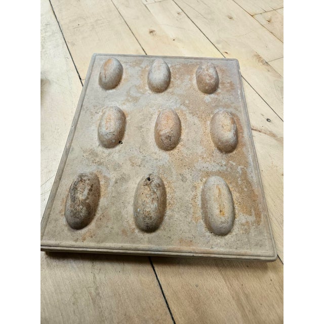 A rare set of two Danish stoneware molds attributed to Kai Riis, dating from the mid-20th century. Originally created as...