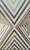A striking handmade Moroccan stool crafted from solid wood and resin, featuring an intricate geometric design that feels...