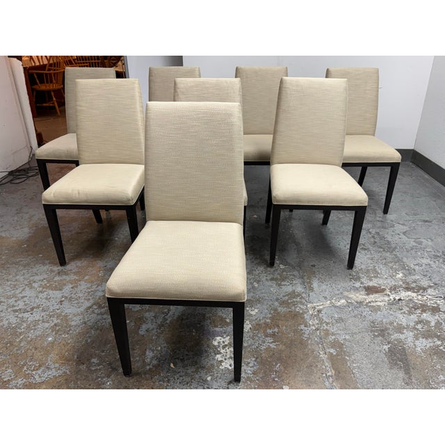 Design Plus Gallery presents a Set of Eight Dining Chairs from Sutter of California. Each armless chair has a tall, gently...