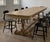 Substantial and beautifully timeworn vintage European trestle dining table crafted from solid white oak with a richly...