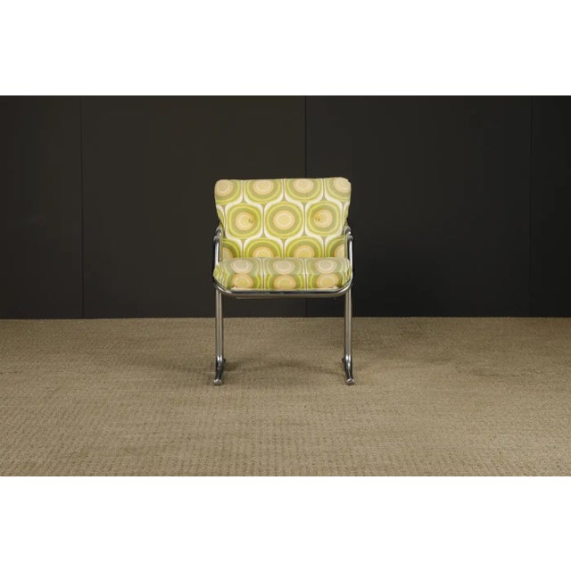 Designed by Jerry Johnson and manufactured by Landes Manufacturing Company in Los Angeles, this set of four 'Arcadia'...