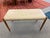 Danish Modern teak upholstered bench designed by Niels Otto Moller for J L Moller, Denmark. The bench is upholstered in a...
