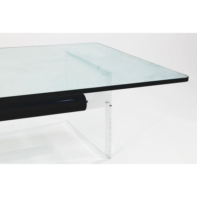 This Contemporary Modern Lucite and Tempered Glass Low Cocktail Table embodies the clean lines and sophisticated...