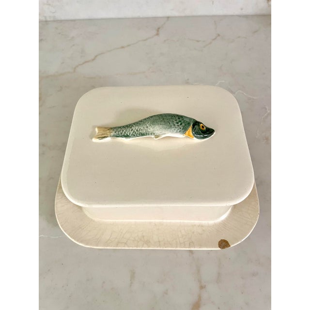 I love these antique sardine boxes. Early 20th Century food storage was so creative. This particular sardine container was...