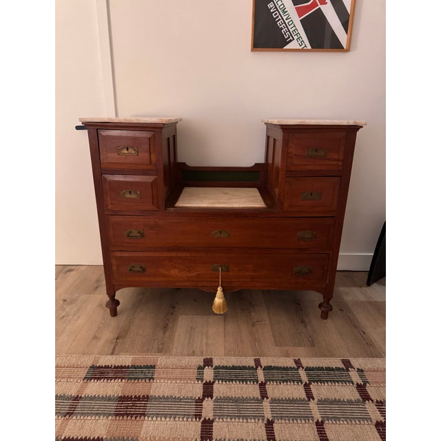 Antique wooden dresser with three heavy marble top surfaces. 20” D 45.5” W 37.5” H