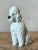 This charming ceramic poodle figurine embodies the playful sophistication and animal fascination popular in mid-century...