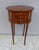 Bring timeless French elegance into your home with this exquisite French Louis XVI round side table, expertly handcrafted...