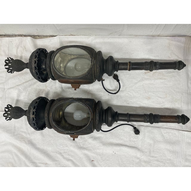A commanding pair of 19th-century carriage lanterns, recently acquired from a New Orleans estate home. These lanterns...