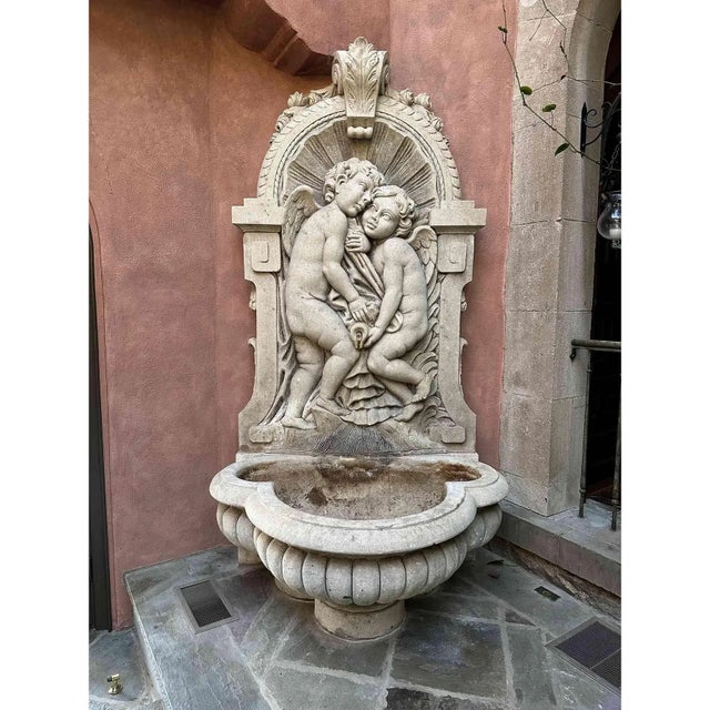 Vintage Italian Carved Limestone Wall Fountain Oversized vintage Italian carved limestone wall fountain with nicely carved...