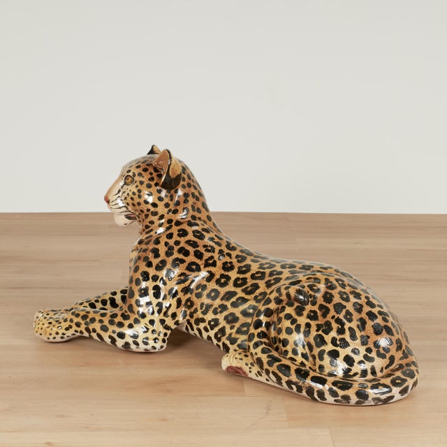 Mid century Italian Leopard in life-like repose, crafted in terracotta, hand decorated and glazed. Stamped "Made in Italy"...