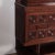 A three piece French oak cabinet in the manner of Charles Dudouyt C 1940. Brutalist styling in the relief design to the...