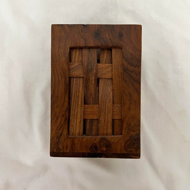Rosewood pencil holder / brush pot with woven sides. Works well for desk organization. Measures 2.75” square x 4” h.