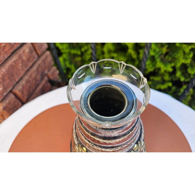 Pre-war silver-plated vase with a glass insert featuring an embossed floral pattern; signed, dimensions: height 25,5 cm,...