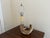 A striking vintage table lamp crafted from a natural ram’s horn, offering a sculptural and textural presence that...