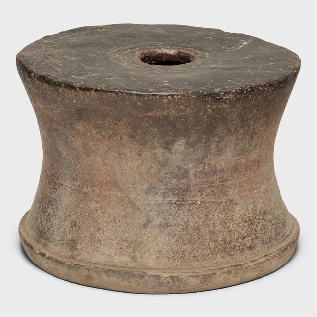 Dated to the mid-19th century, this low, terracotta pedestal base from Shanxi province likely originated as a column base...