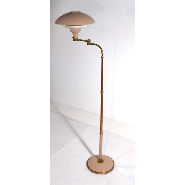 Classic Thurston design Mid Century saucer top reading lamp manufactured by Lightolier. The lamp can be raised to 52 in,...