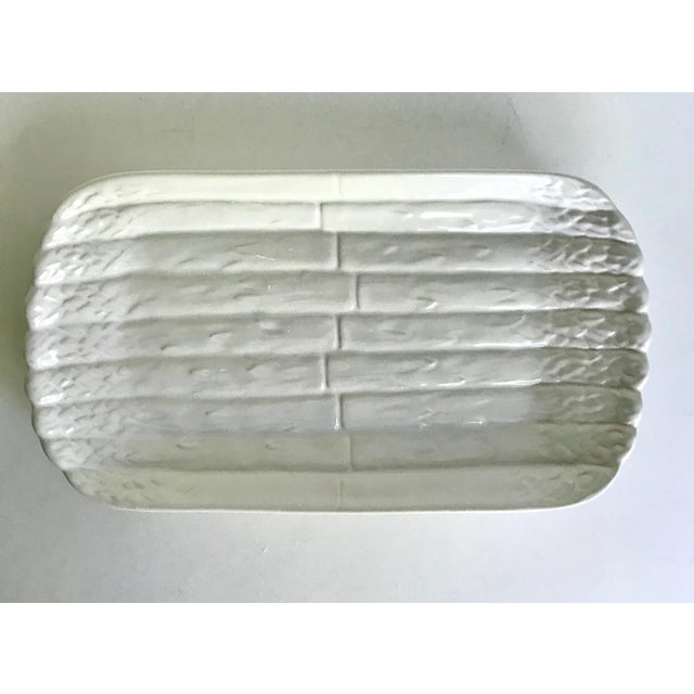 This is a wonderful serving dish in by Bordallo Pinheiro in the form of asparagus. It's perfect for using as in the...