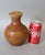 Ancient Chinese Han Dynasty pottery covered hu jar, dating to approximately 206 BCE–220 CE, with a warm amber-brown lead...