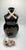 **Skull and Bones Rum Bottle Decanter from the 1950s** This is a handcrafted ceramic decanter with a unique design. Hand-...