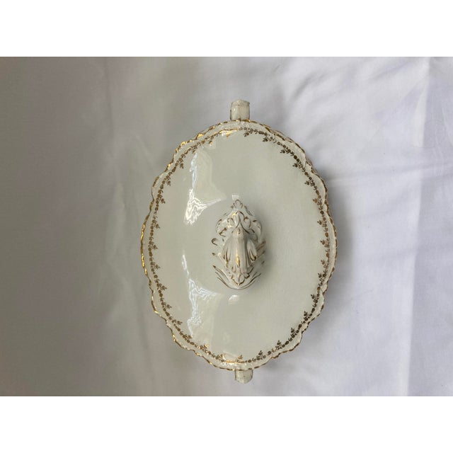 This is a Vintage Homer Laughlin Covered Vegetable Dish in the Hudson H-94 pattern with decorative gold guilding, which...
