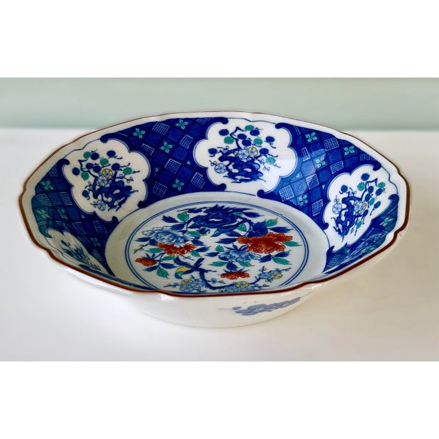 Vintage Imari Decorative Bowl. Delicate and ornate design, combining elegance and artistry. Its scalloped edges and...