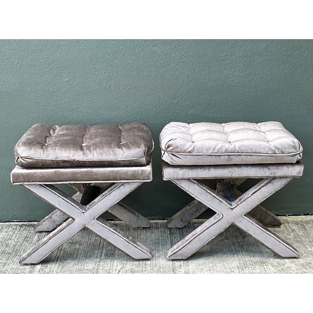 This pair of vintage tufted velvet X benches brings a sculptural mid-century silhouette to seating, bedroom, dressing, or...